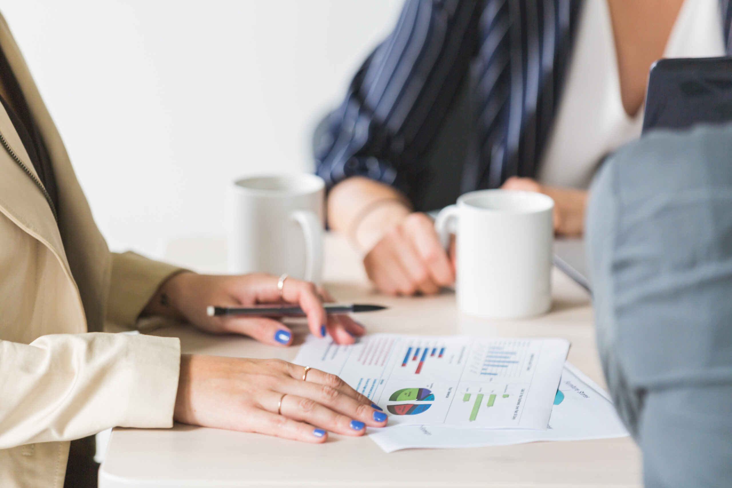 reading-charts-at-business-meeting